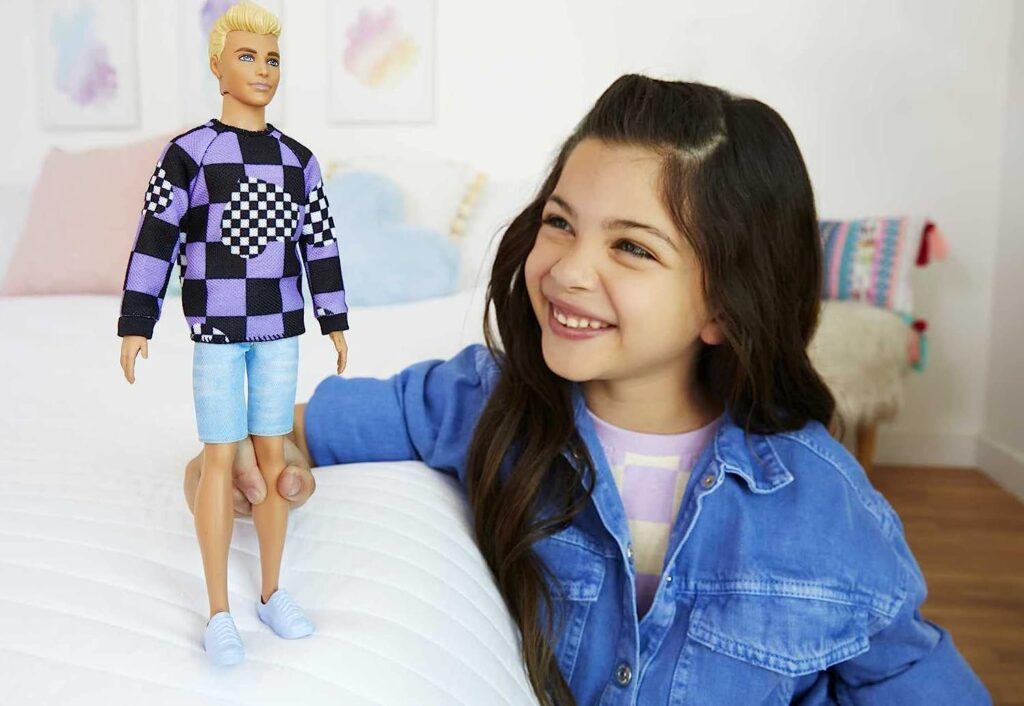 Barbie Fashionistas Ken Fashion Doll #191 with Blonde Cropped Hair in Checkered Sweater, Denim Shorts  White Sneakers